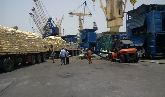 Cargo being off loaded into the bagging machine hopper